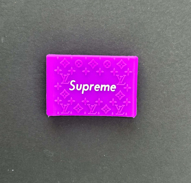 Pink Supreme grip featuring iconic Louis Vuitton pattern, designed for stylish grip and control.