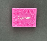 Supreme pink grip with Louis Vuitton pattern, perfect for stylish accessories and barbershop tools.