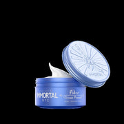 Immortal NYC pomades 5oz jar with lid open showing creamy texture for styling and hold.