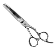 Hairdressing scissors on a white background