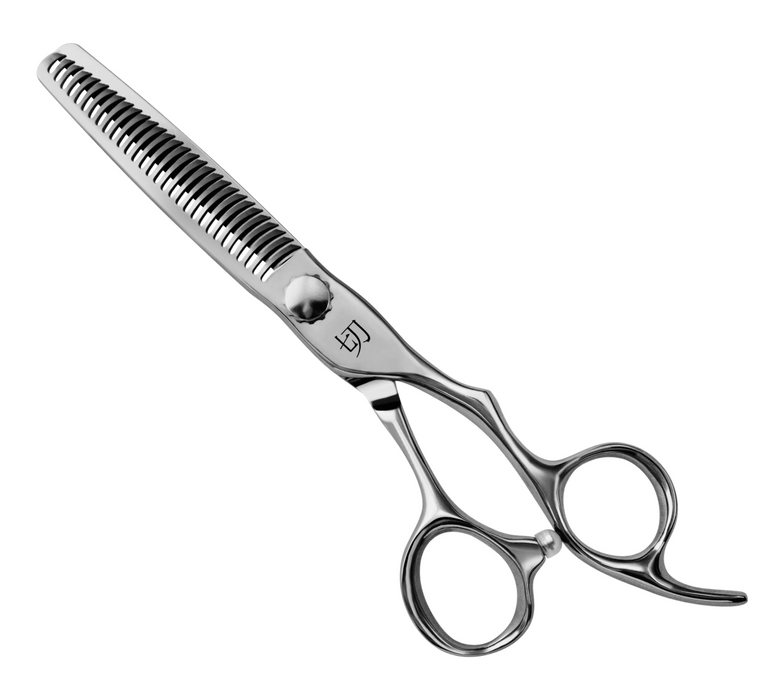 Hairdressing scissors on a white background