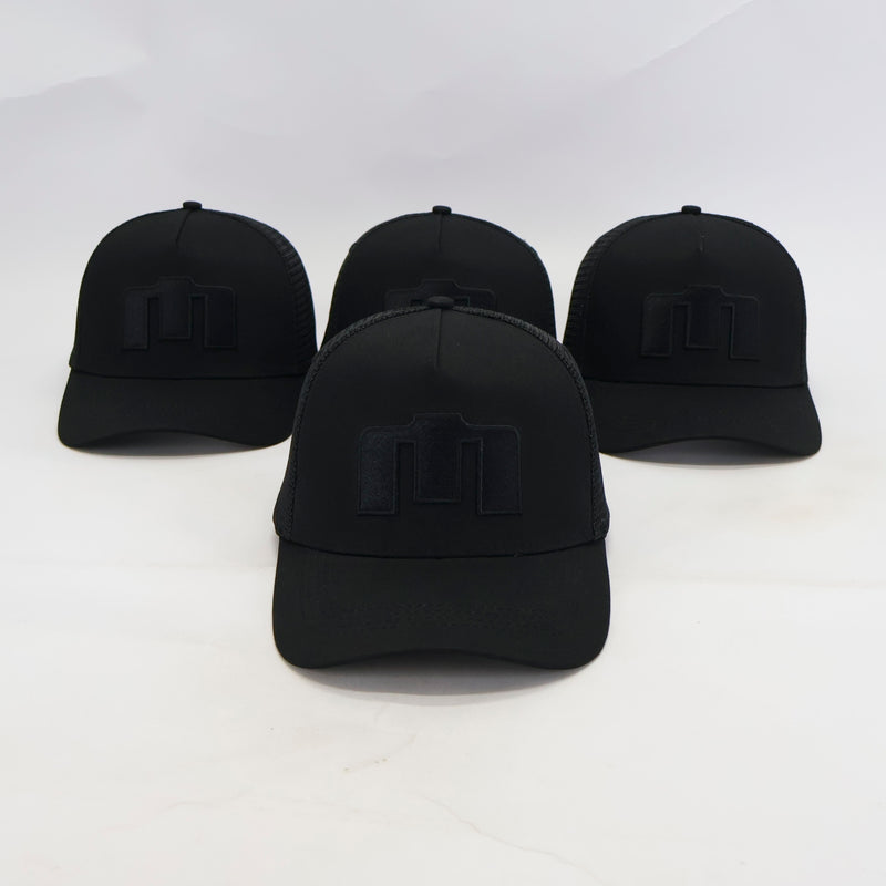 Four black baseball caps with a logo on a white background