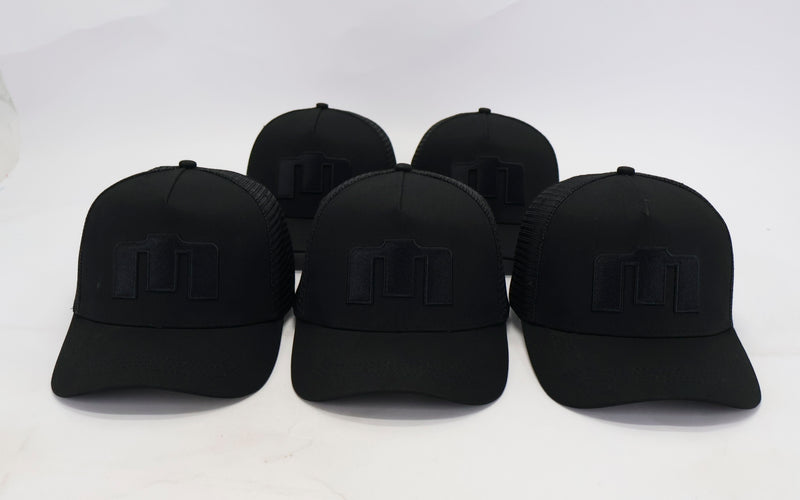 Five black baseball caps with a logo on a white background