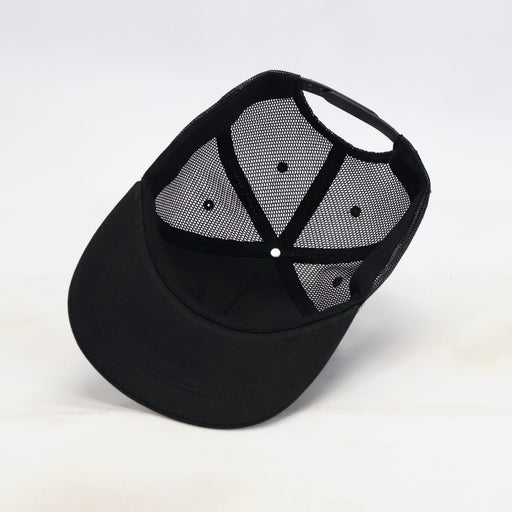 Black cap with mesh back on a white background