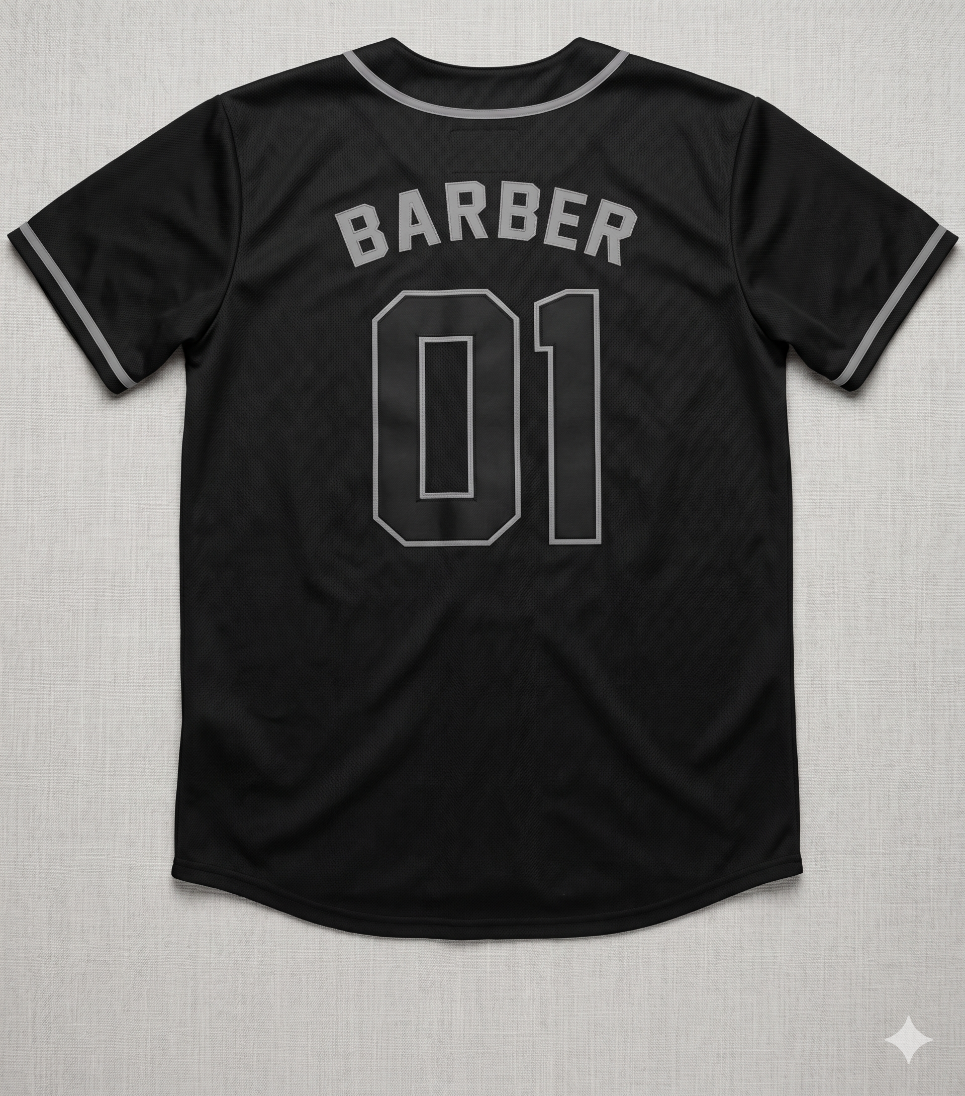 Black baseball jersey with 'BARBER 01' text on a textured gray background
