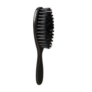 Black hairbrush with bristles on a white background