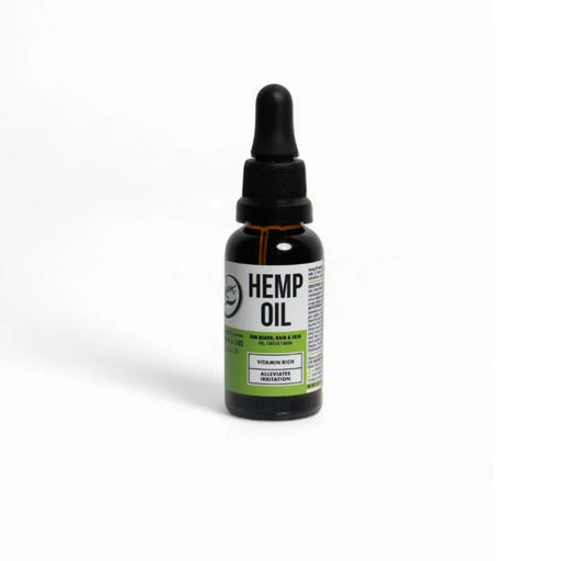 Bottle of hemp oil with a dropper on a white background
