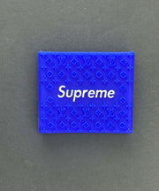 Blue Supreme grip with embossed Louis Vuitton pattern for stylish and functional use.