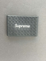 Supreme clipper grips featuring a black Louis Vuitton design for barbers, enhancing comfort and control.