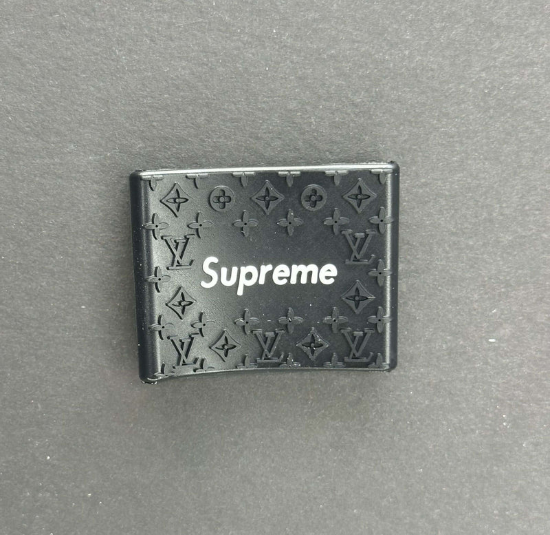 Supreme clipper grips featuring a black Louis Vuitton design for barbers, enhancing comfort and control.