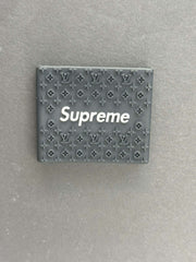 Supreme clipper grips featuring a black Louis Vuitton design for barbers, enhancing comfort and control.
