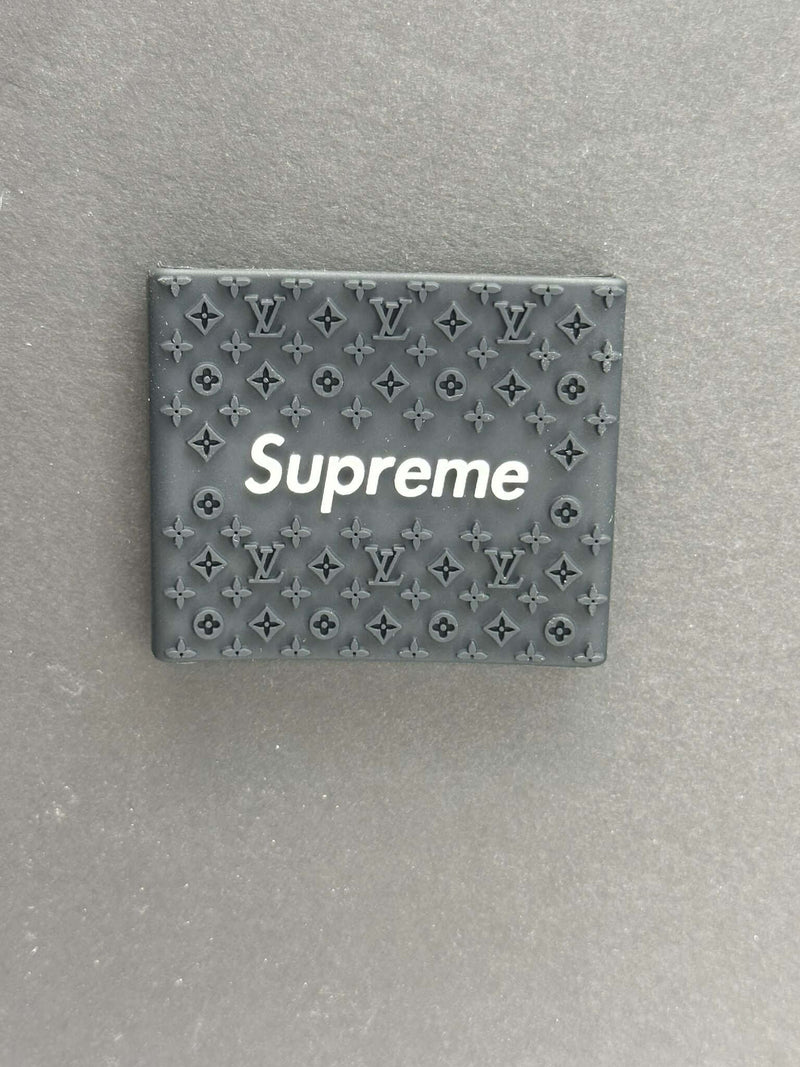 Supreme clipper grips featuring a black Louis Vuitton design for barbers, enhancing comfort and control.